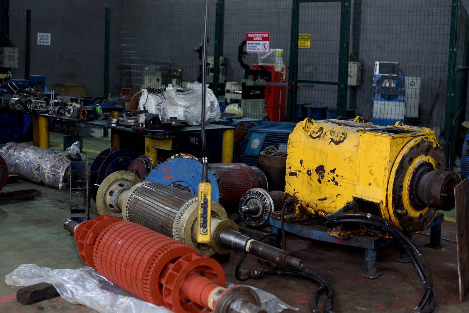 Electric motors and rotors staged for overhaul