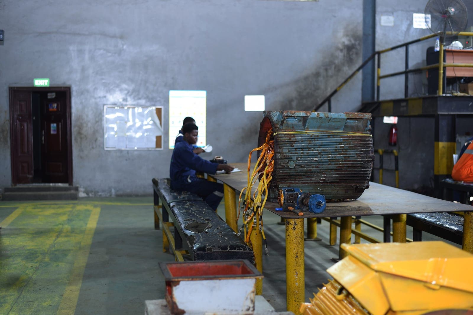 Technician servicing equipment at the workbench